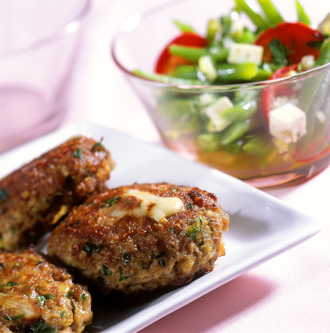Lamb rissoles with bean and goat's cheese salad