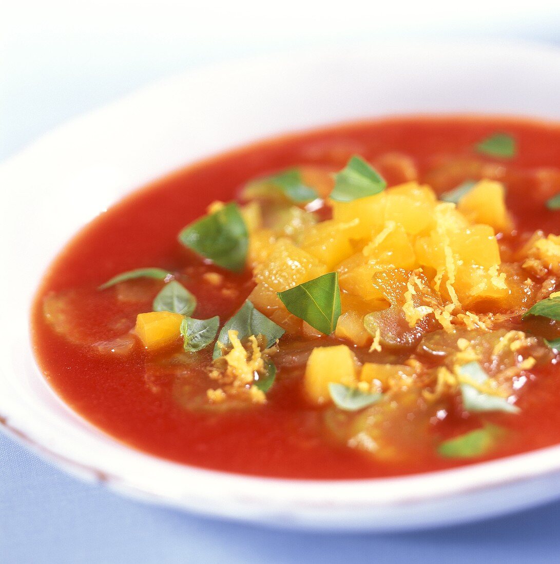 Cold tomato and apricot soup with basil