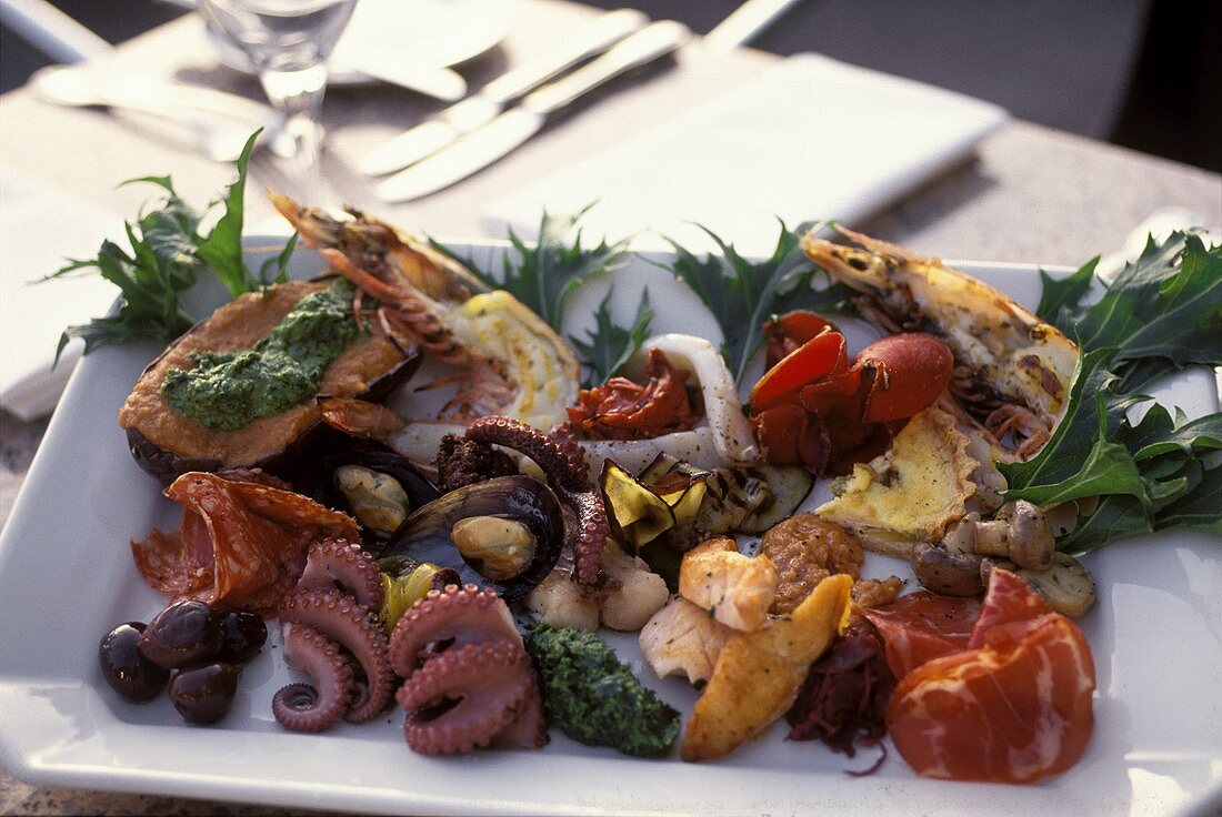 Antipasti platter with seafood, sausage etc