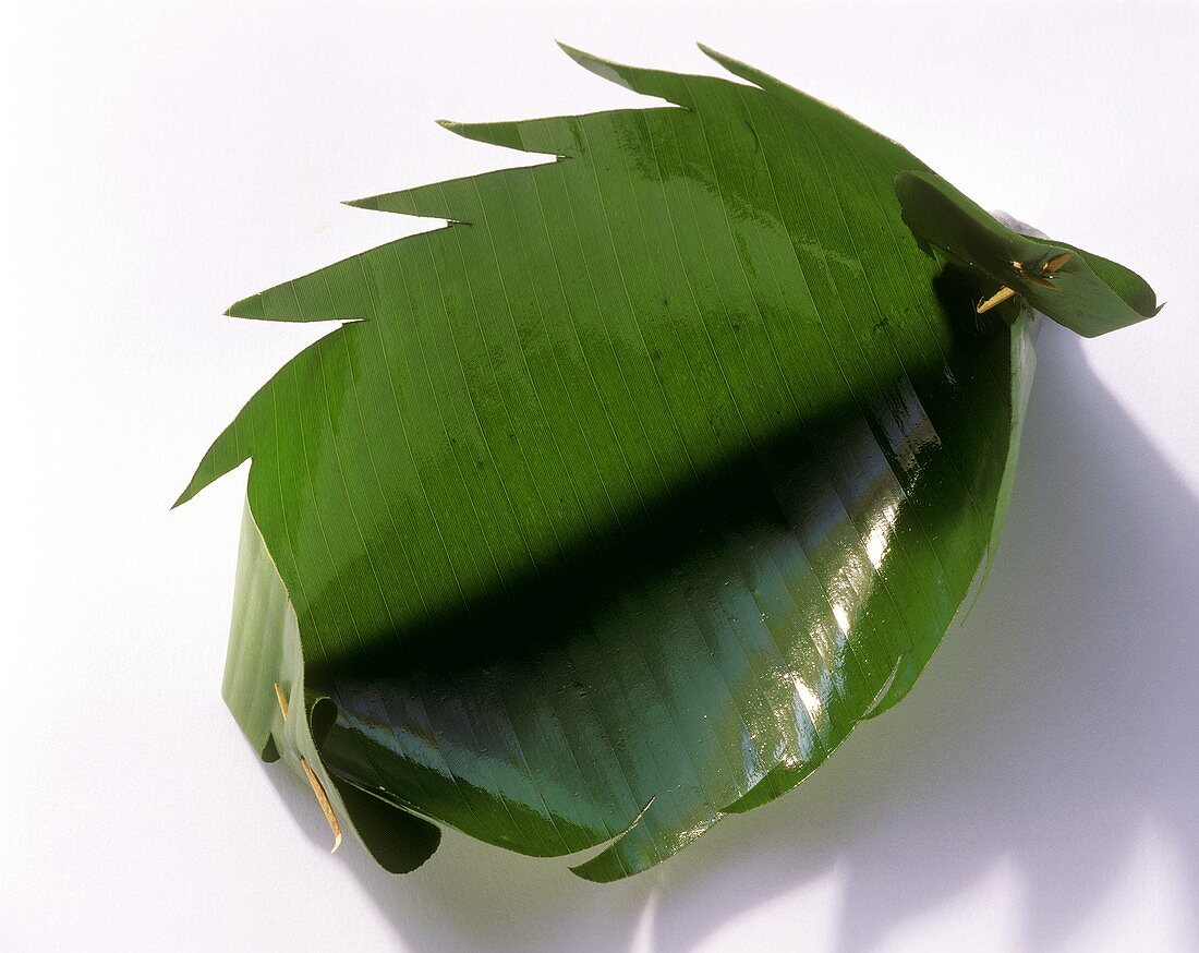Banana leaf bowl with jagged edges