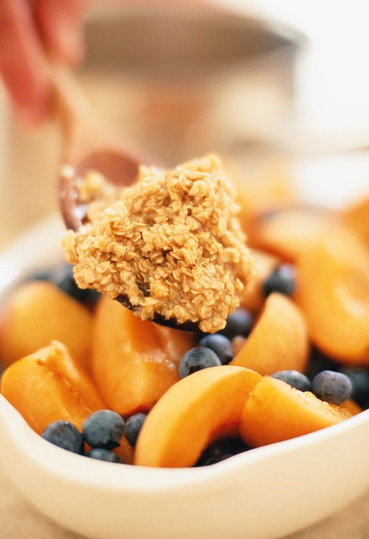 Breakfast mix with peaches, blueberries, cereal flakes