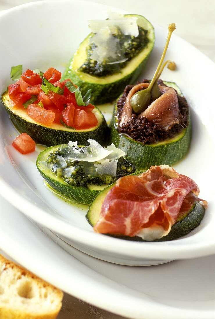 Antipasto di zucchini (Courgette slices with different toppings)