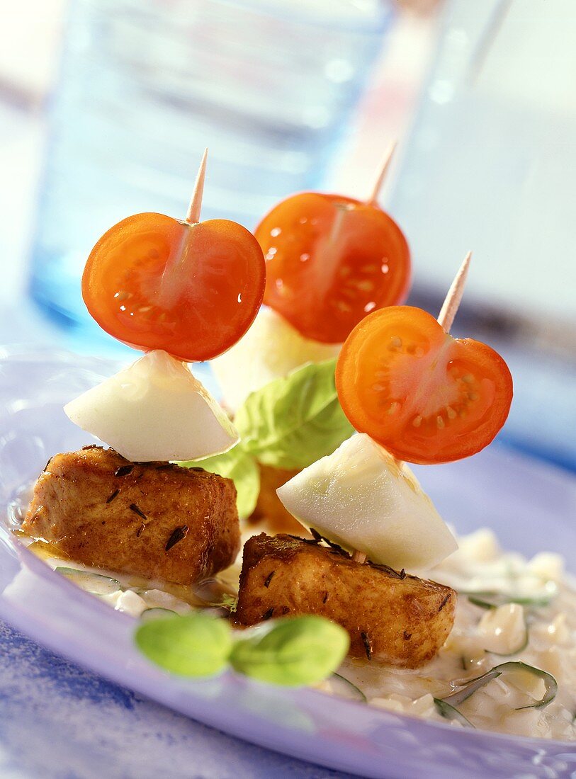 Turkey breast and vegetables on sticks with dip