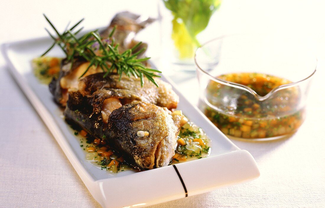 Trote al vino bianco (trout in white wine sauce with rosemary)