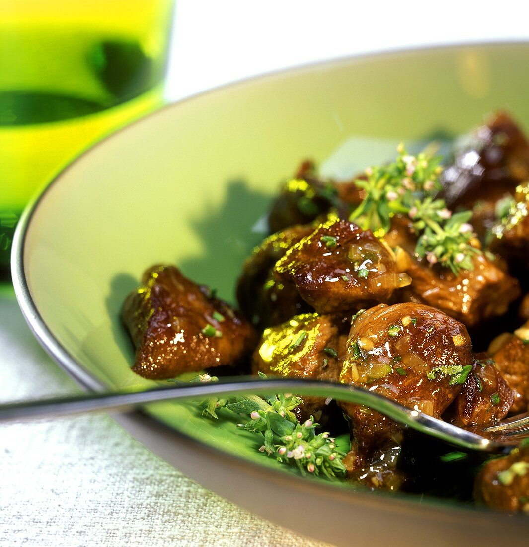 Spezzatino d'agnello (lamb ragout with herbs, Italy)