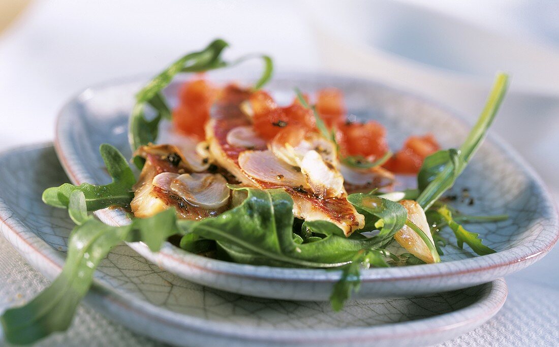 Red mullet in tomato vinaigrette with rocket