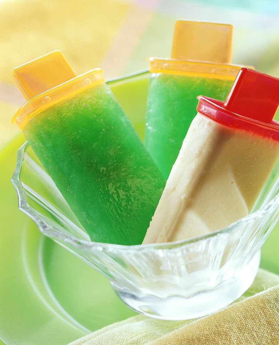 Green jelly ice cream & mango & coconut ice cream on stick