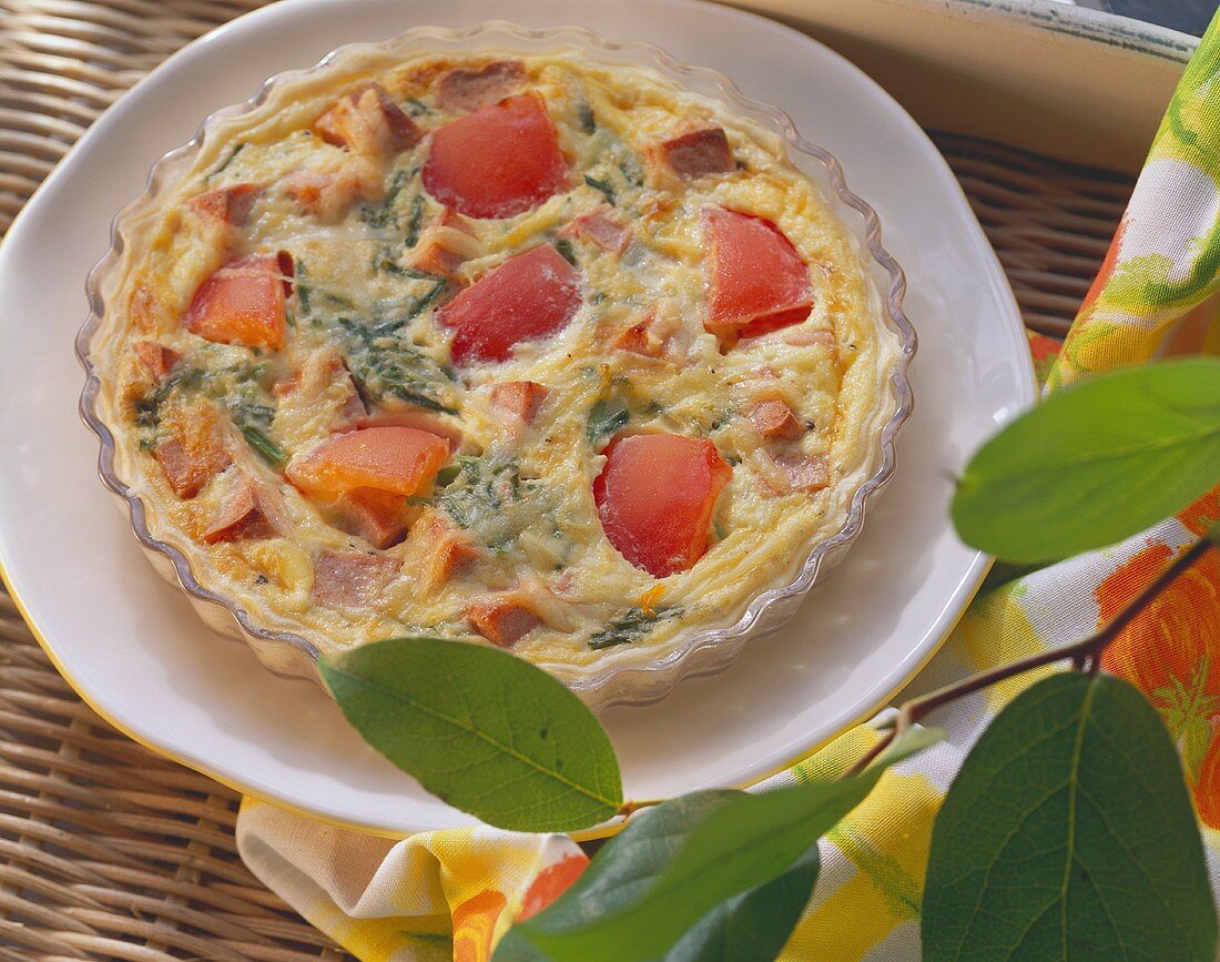 Quiche with Lyon sausage and tomatoes