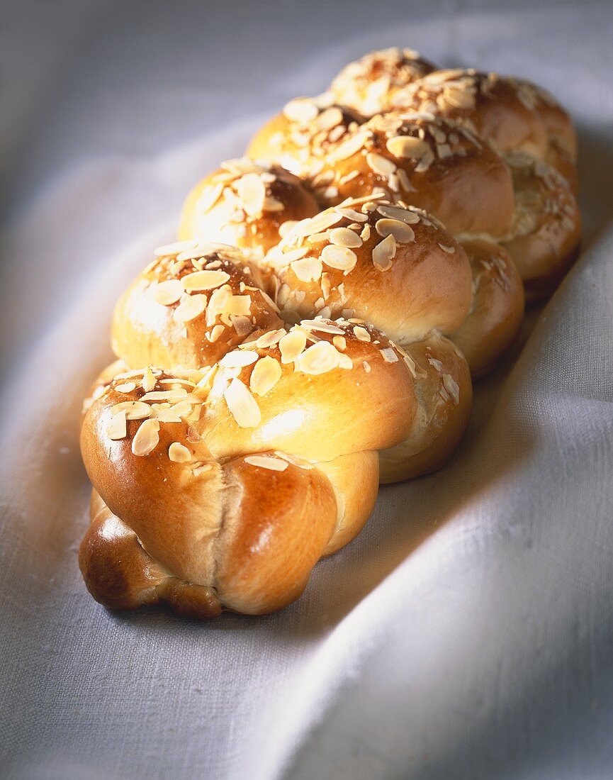Bread plait with flaked almonds