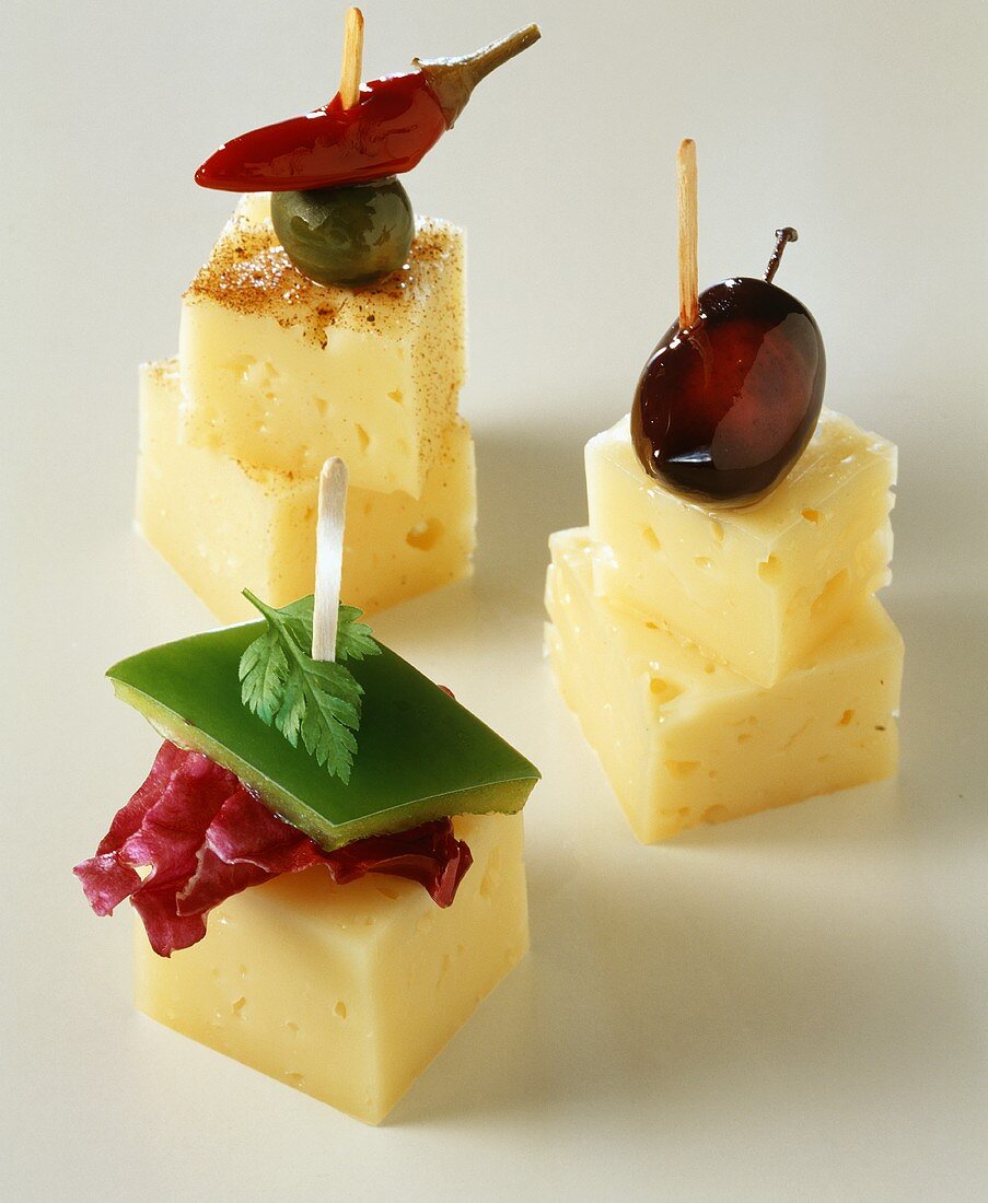 Cheese snacks with olives, peppers etc