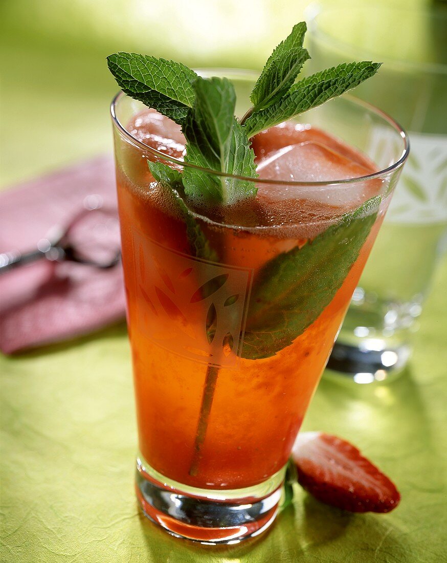 Strawberry cocktail with rum and fresh mint