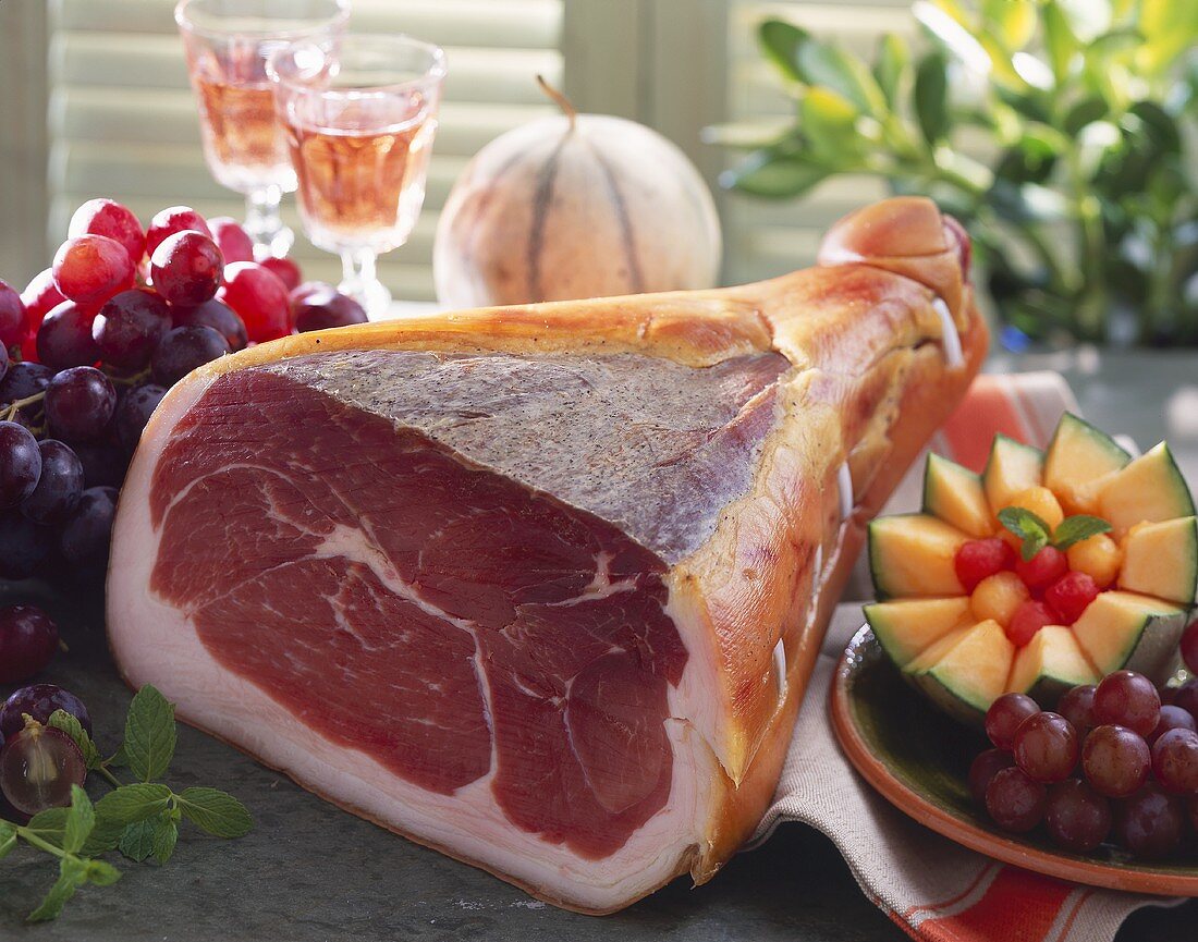 Italian ham, red grapes and melon