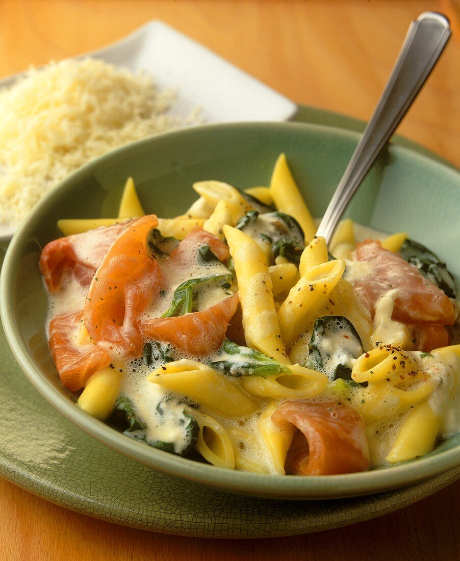 Penne with salmon and spinach in cream sauce