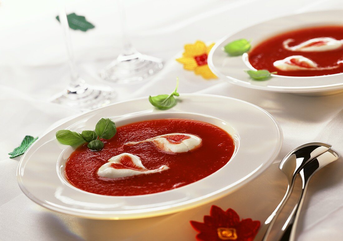 Tomato soup with mozzarella and basil