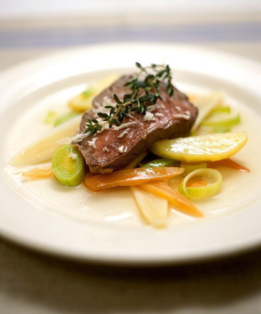 Boiled beef on root vegetables