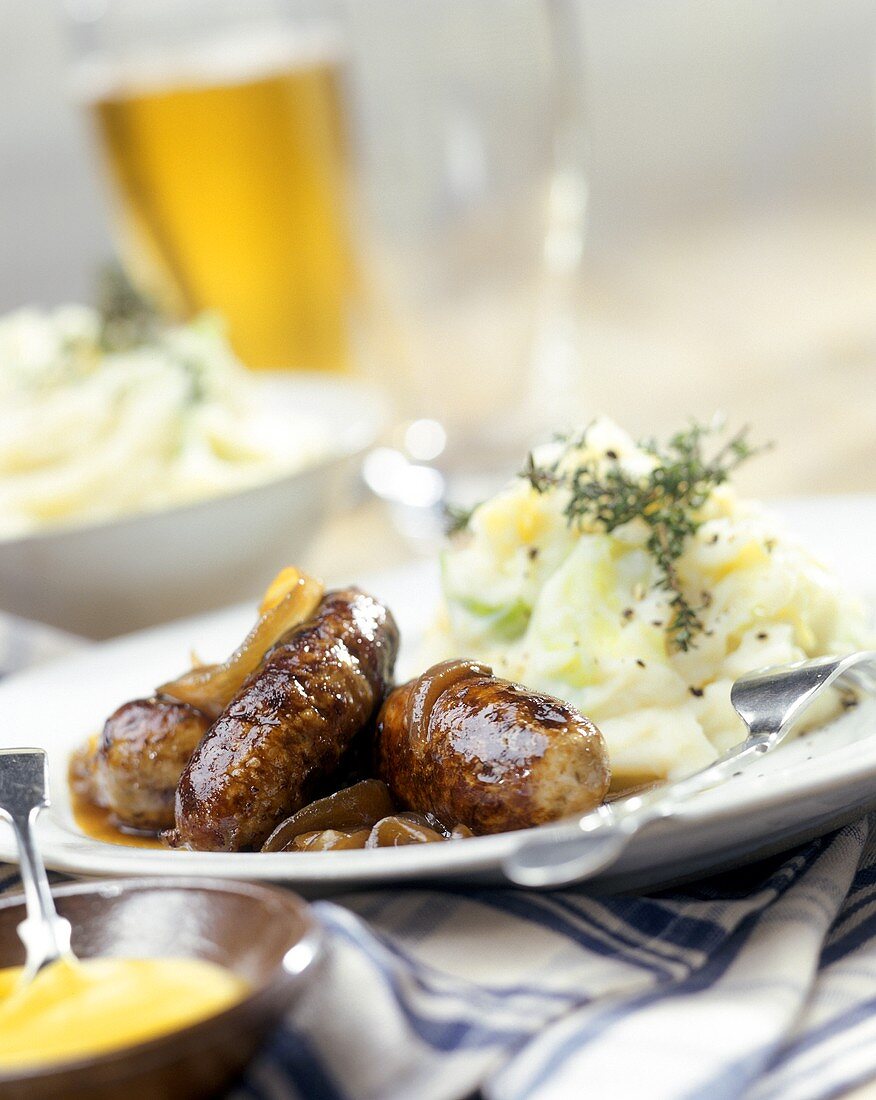 Sausages with onions and mashed potato