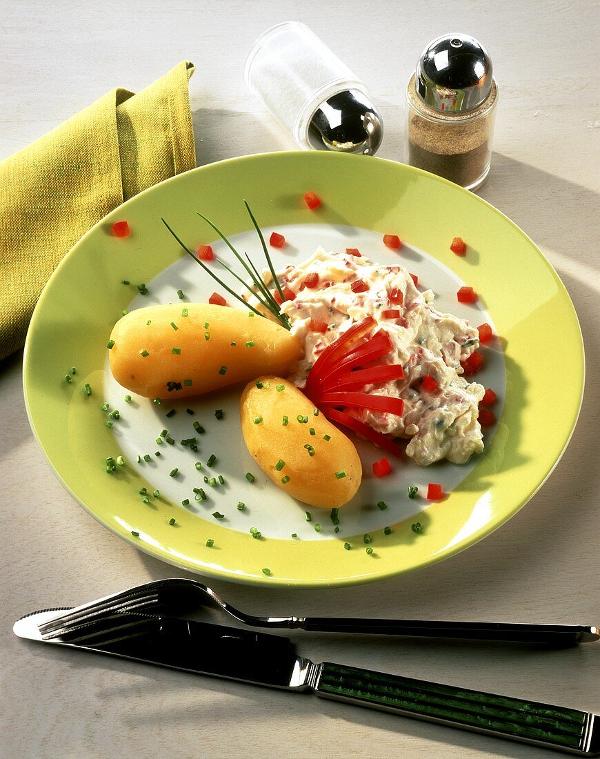 Boiled potatoes and cheese mousse with peppers and chives