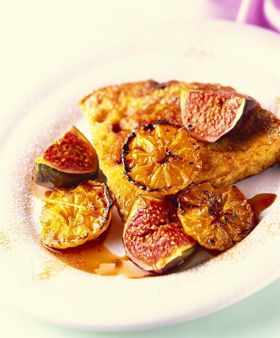 Orange tart with baked oranges and figs