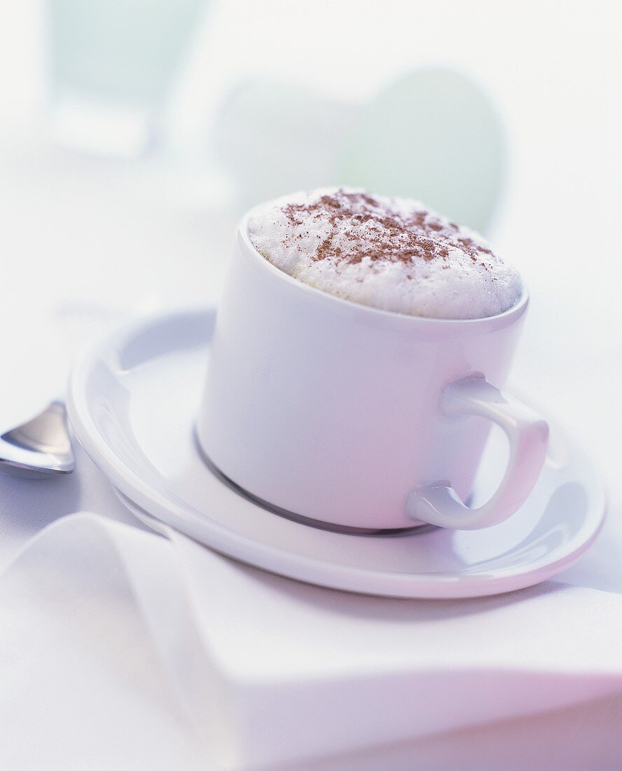 Cappuccino, sprinkled with cocoa