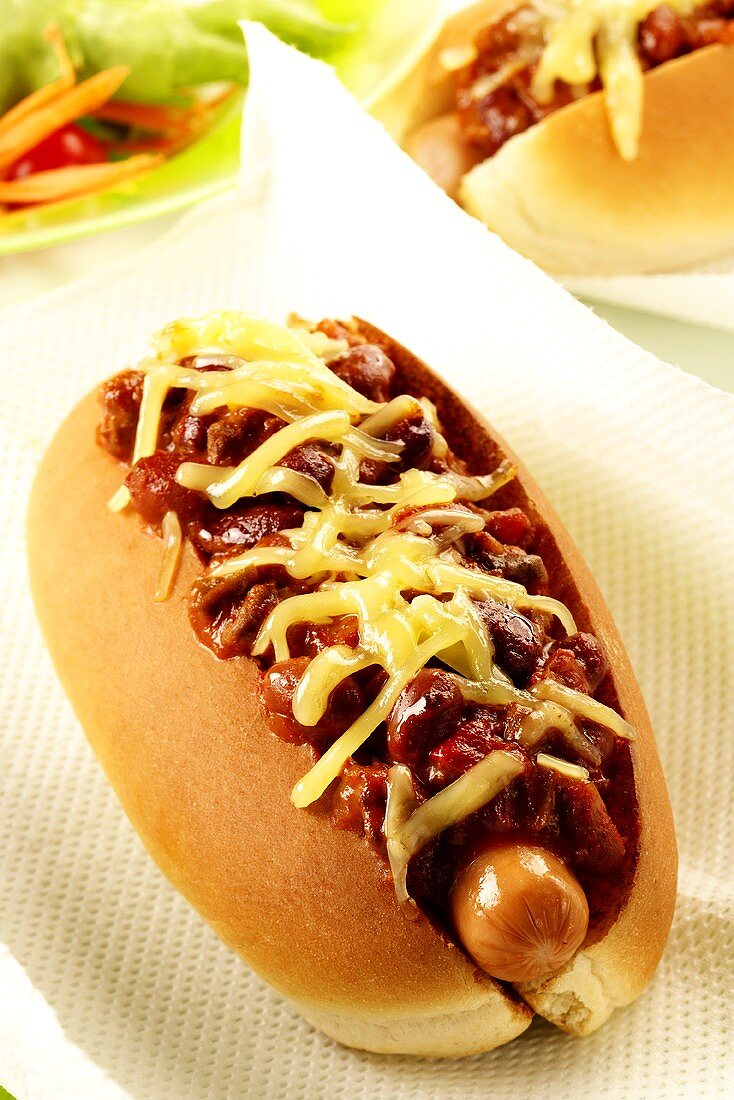 Hot dog with chili sauce and cheese