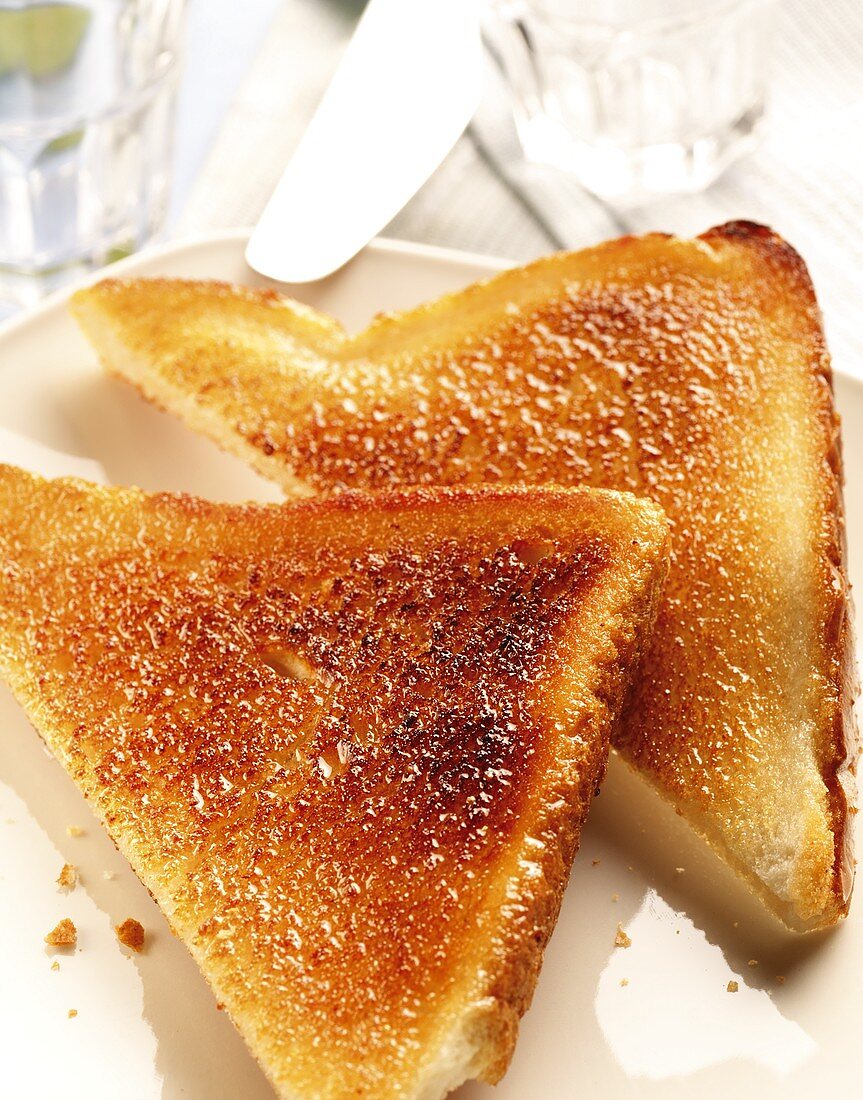 Toast triangles on white plate