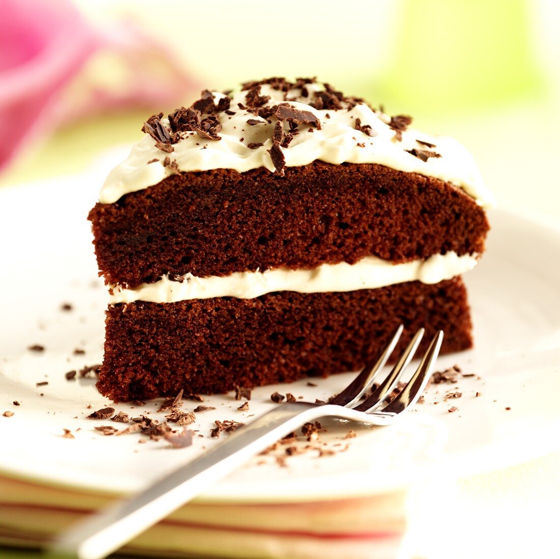 Piece of chocolate cake with cream