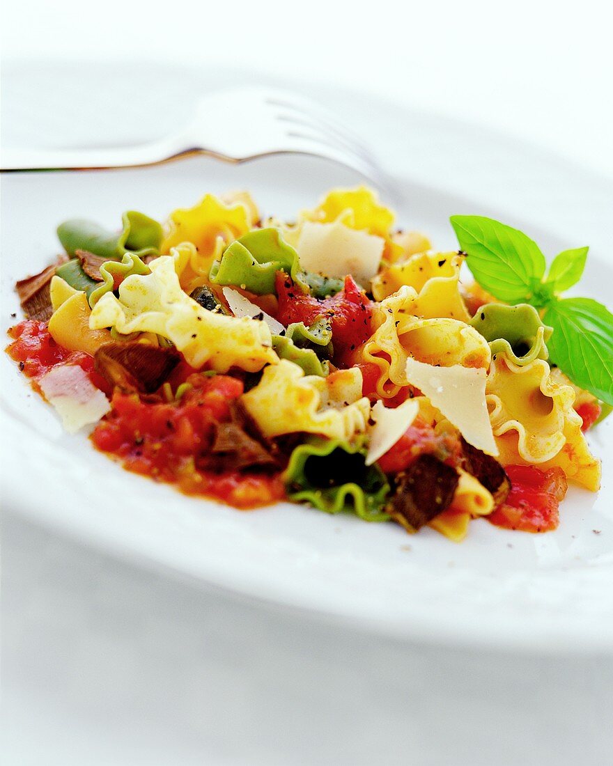 Pasta with tomatoes, olives and Parmesan