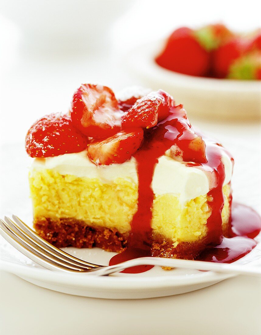 Piece of cheesecake with strawberries