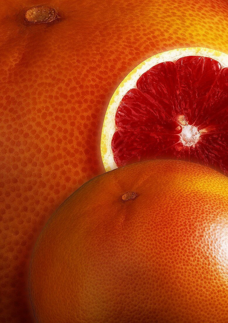 Rosa Grapefruit auf Grapefruit-Hintergrund
