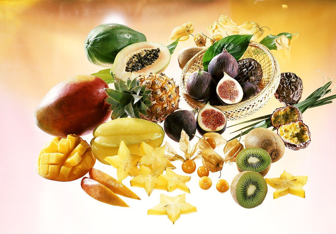 Various exotic fruits, some in basket