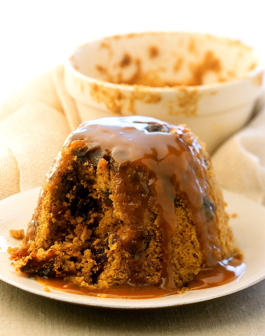 Steamed pudding with toffee sauce, England