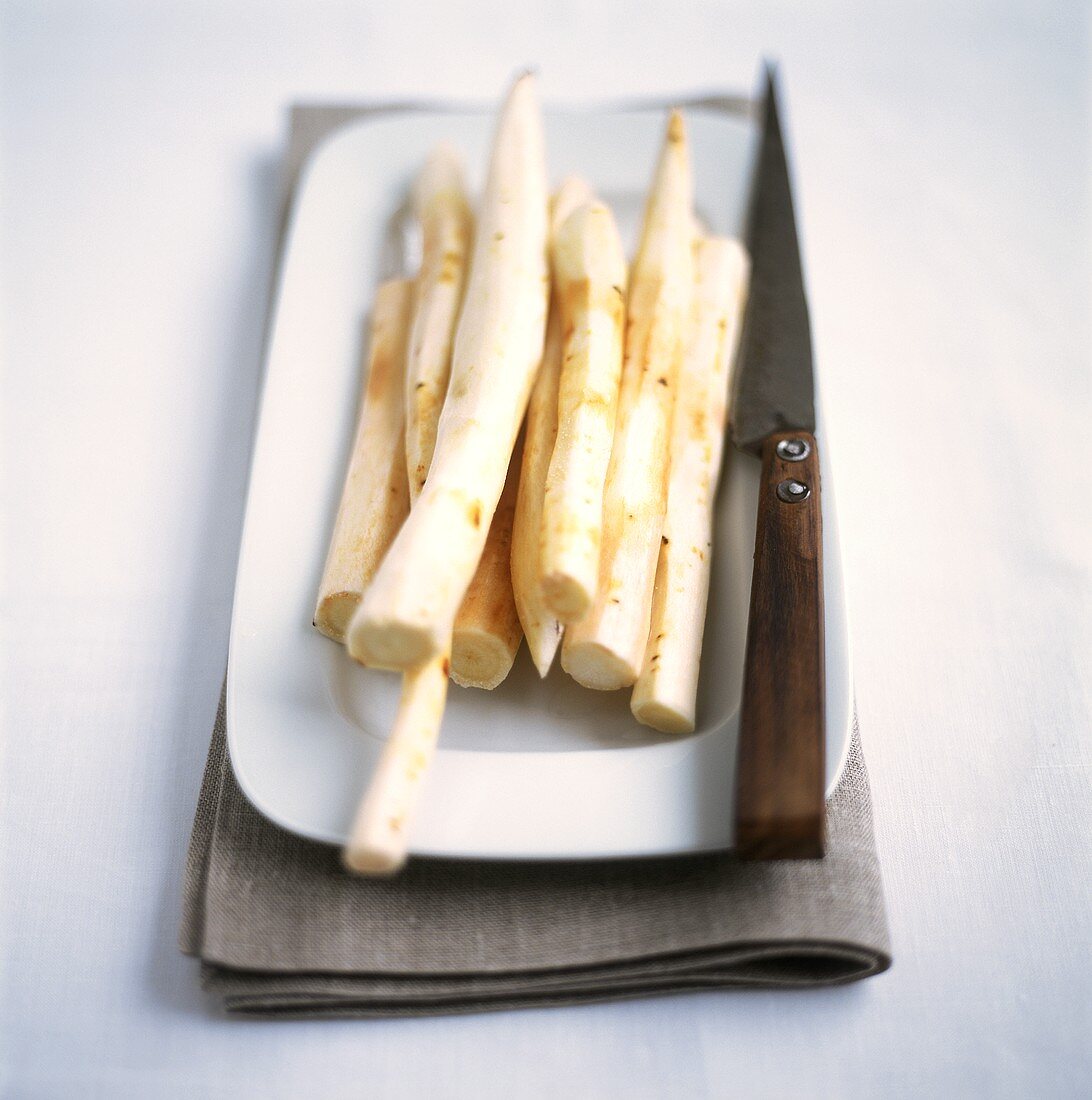 Peeled scorzonera with roots