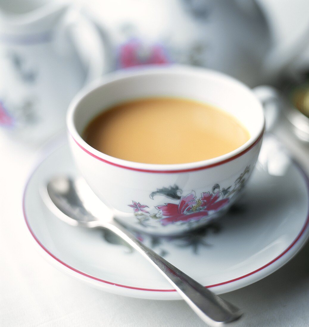 Coffee with milk in cup