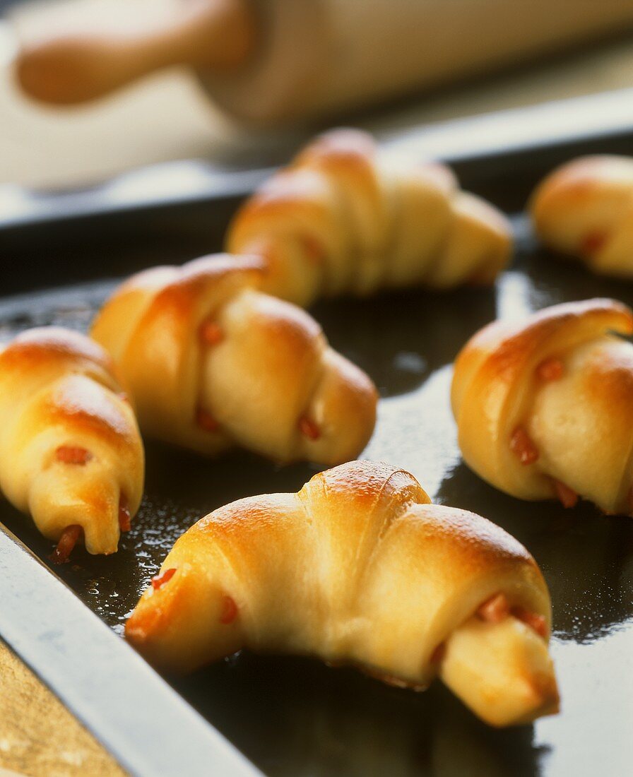 Savoury croissants on baking tray