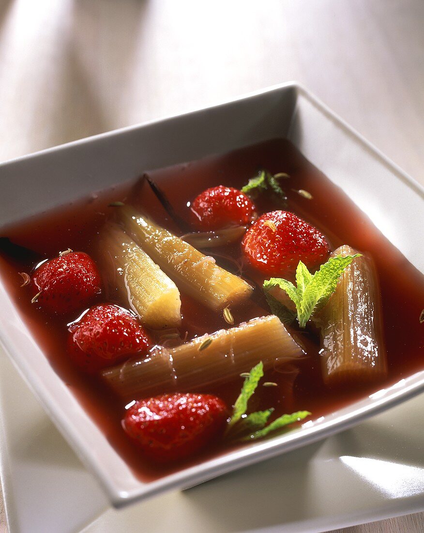 Strawberry and rhubarb soup with mint leaves