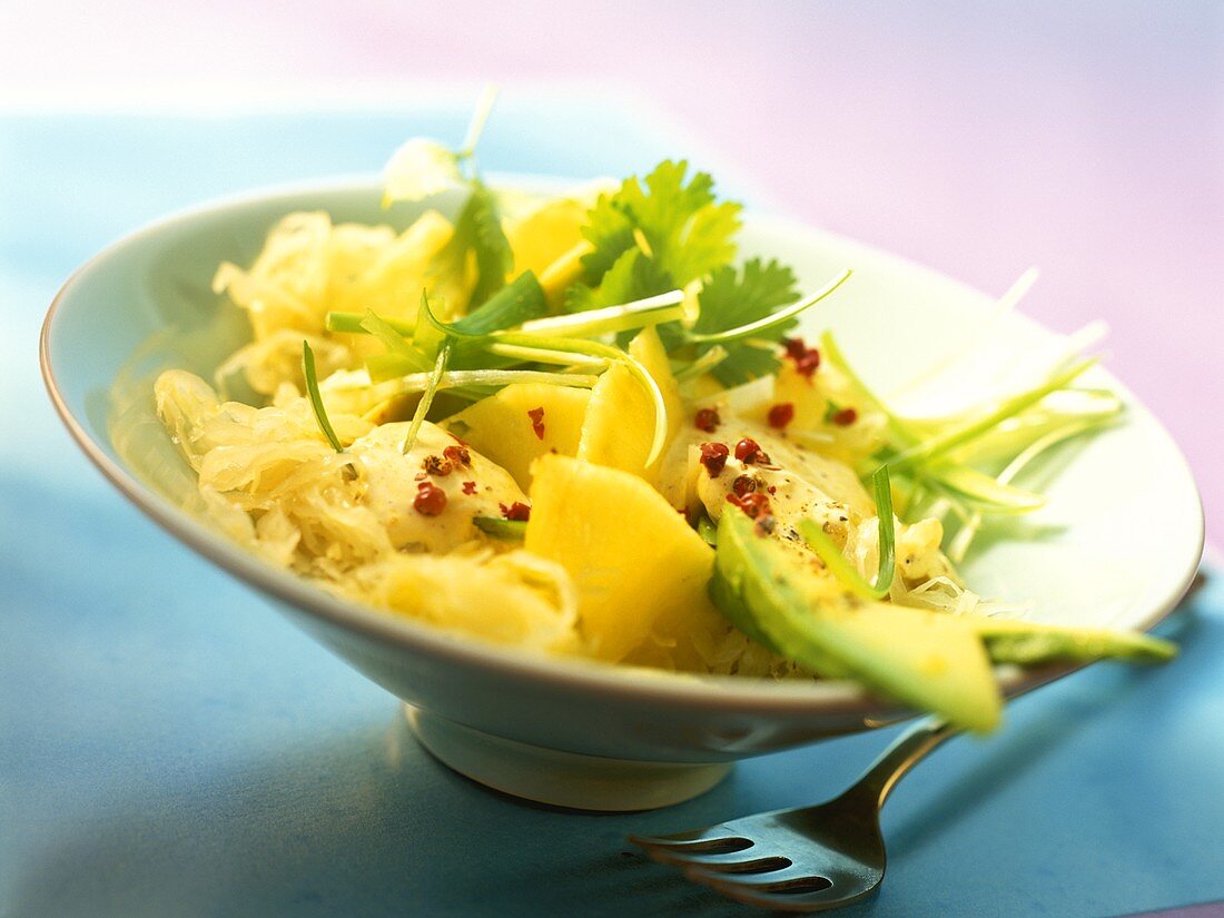 Exotic sauerkraut salad with pineapple and avocado