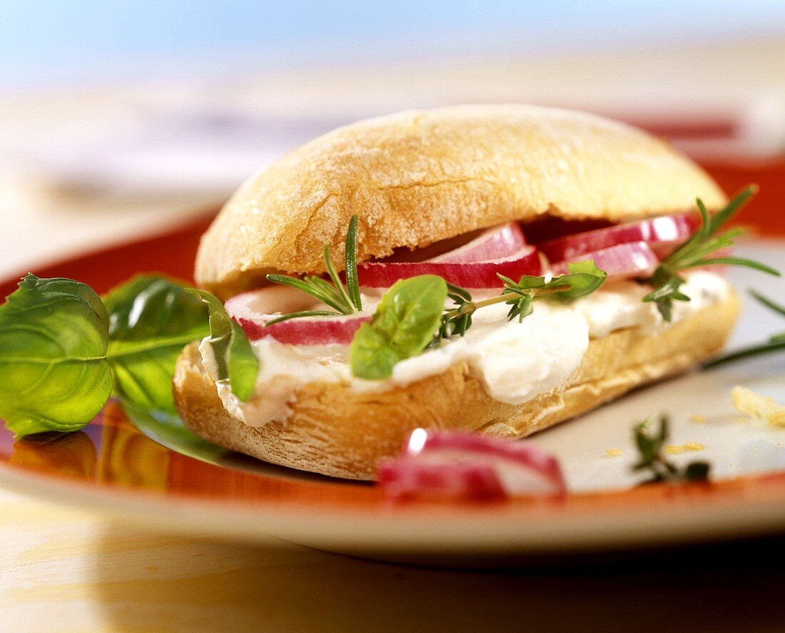 Panini with ricotta mousse, onions and fresh herbs