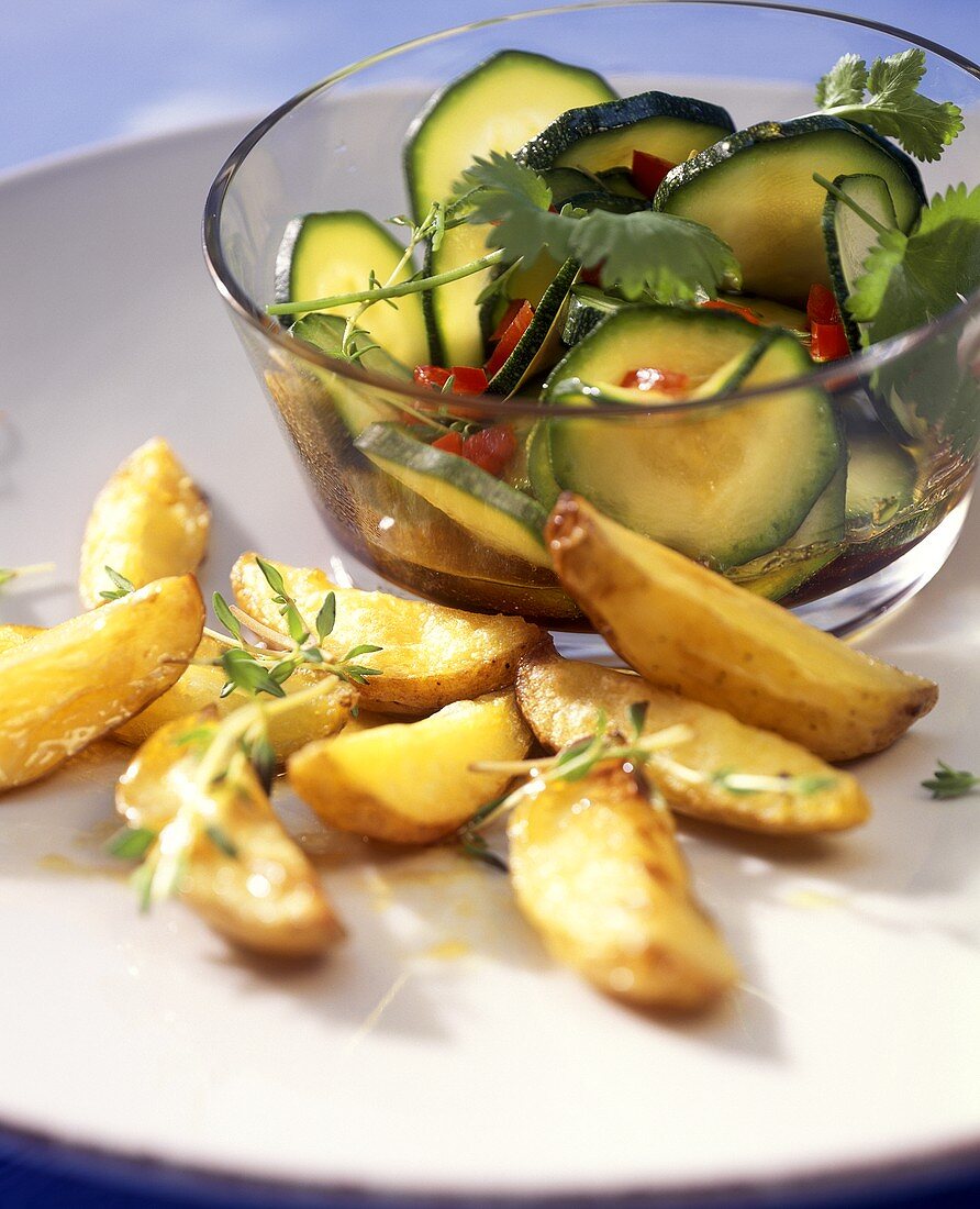 Baked potatoes with courgette salad