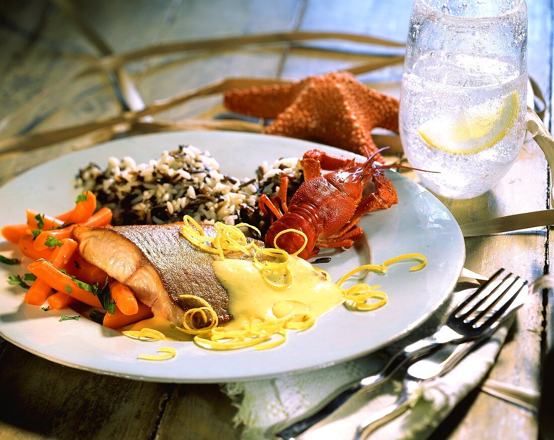 Salmon and crab with carrots, wild rice and lemon sauce