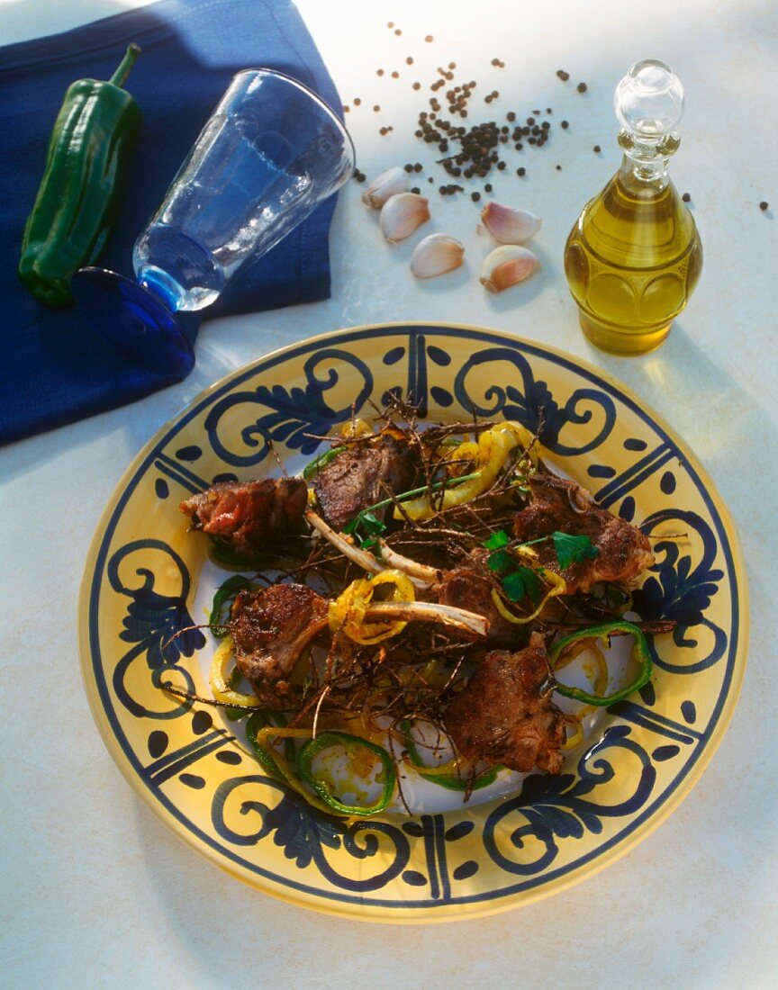 Tunisian grilled lamb cutlets (Mechoui) with onions