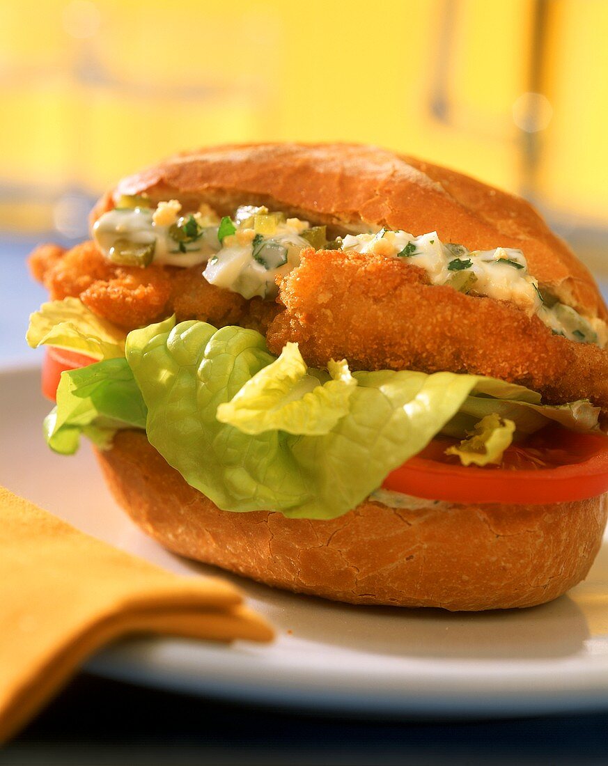 Schnitzel burger with egg sauce and lettuce