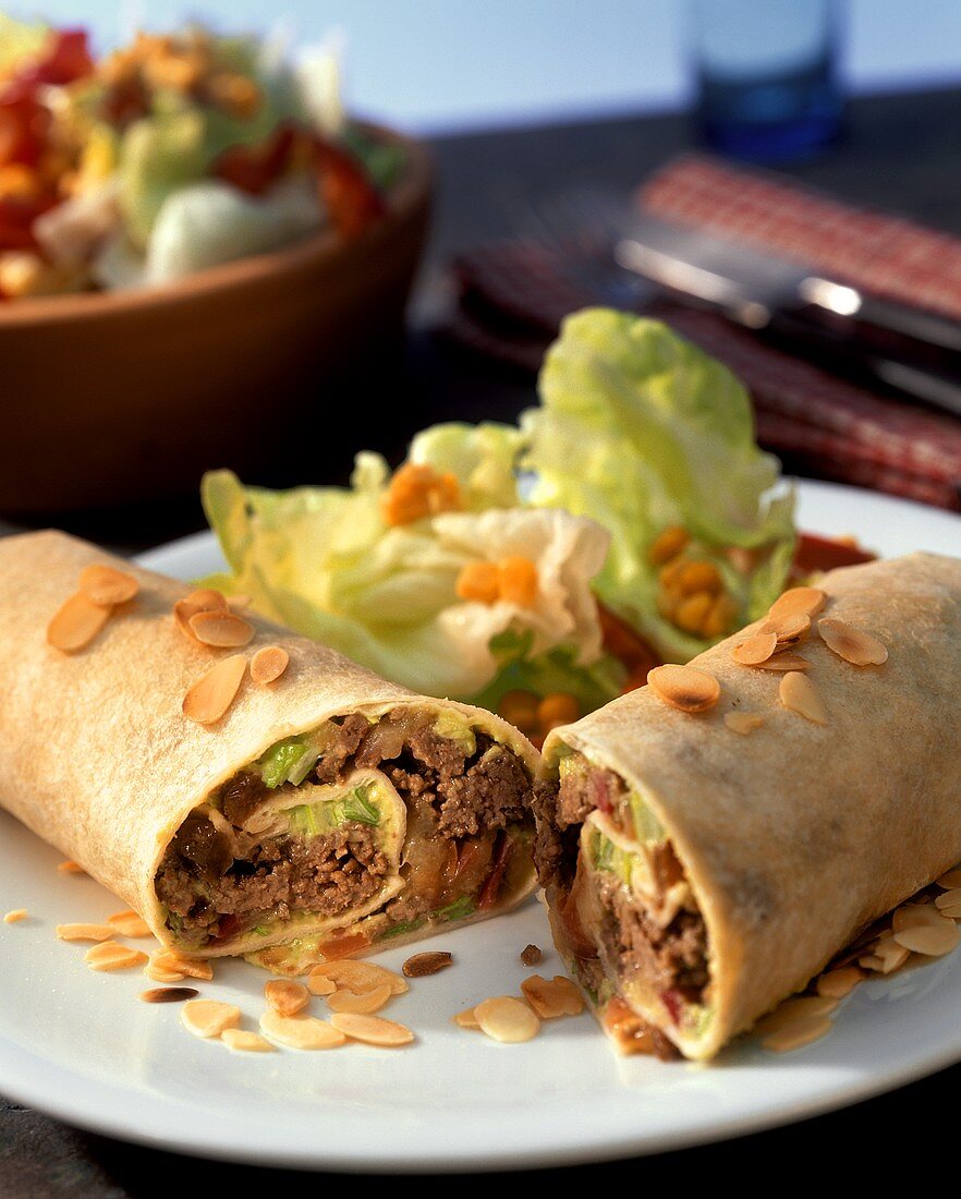 Enchiladas with apple and mince filling and lettuce
