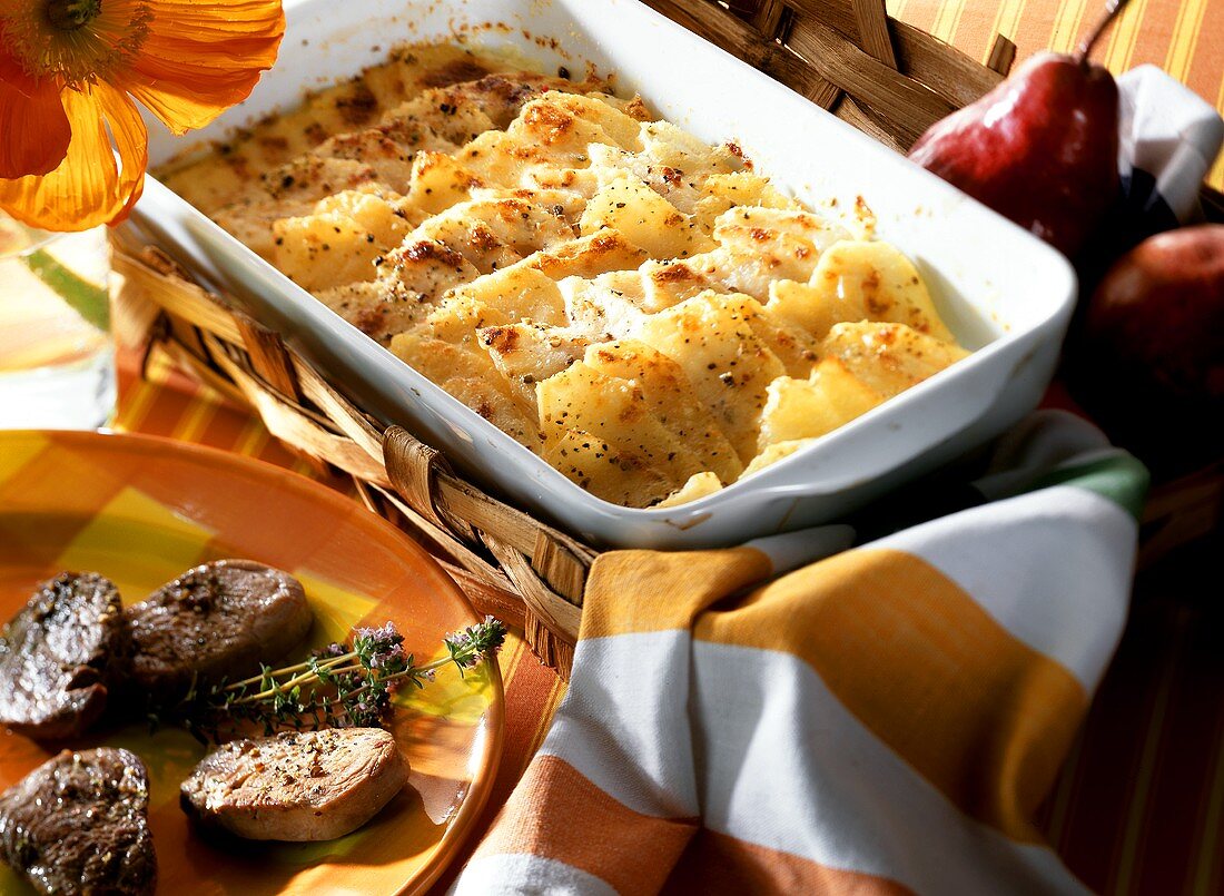 Swiss potato gratin with pears and grated cheese