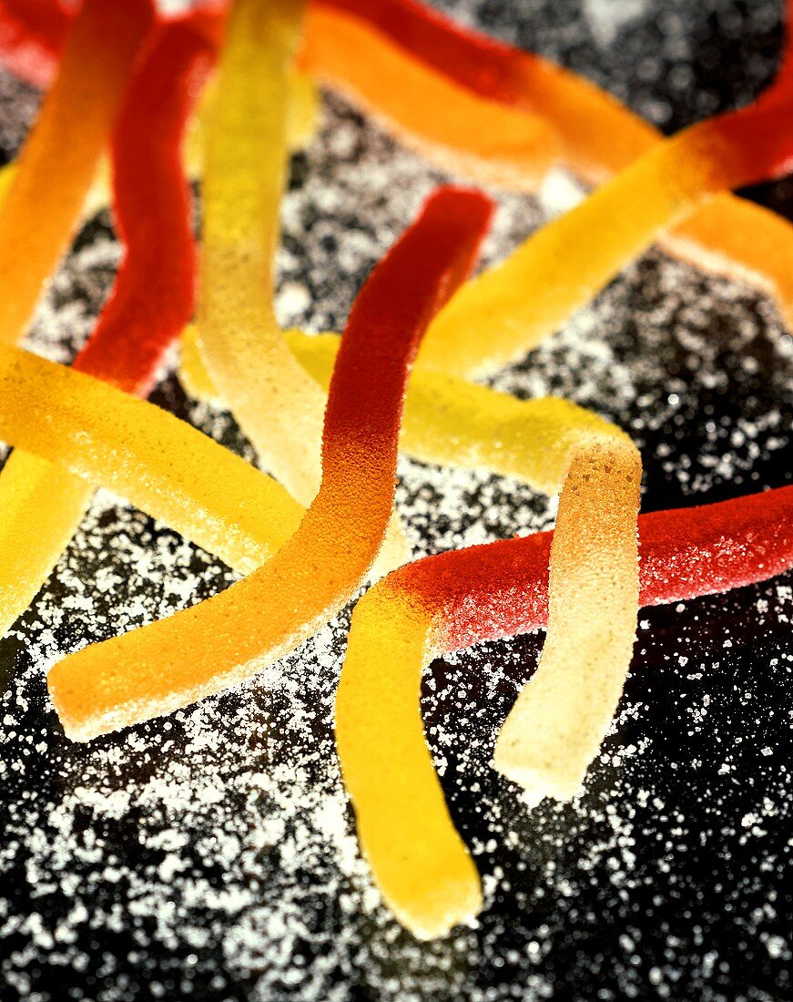 "Saure Pommes" (tart fruit jelly sticks with sugar)