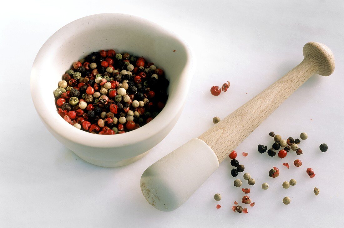 Mixed peppercorns in mortar