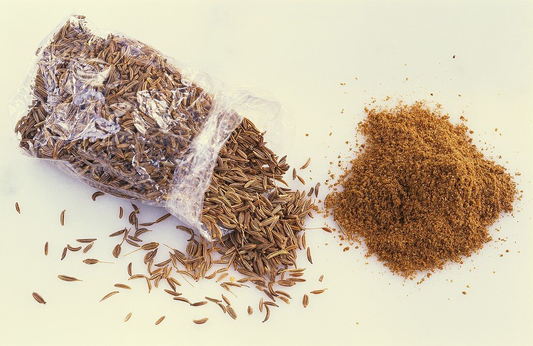 Caraway in cellophane bag and ground caraway