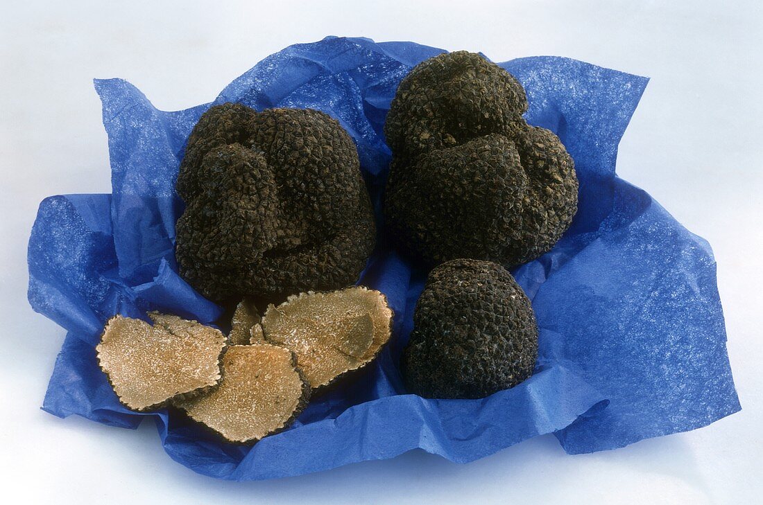 Summer truffles on blue paper