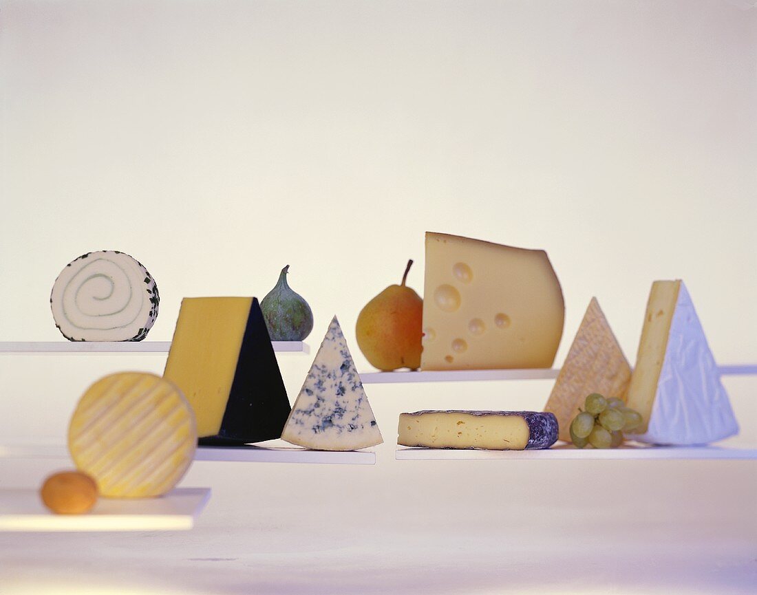 Various types of cheese and fruit