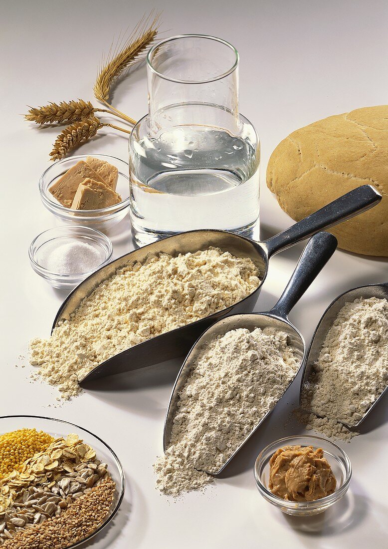 Still life: ingredients for baking bread (flour, yeast, water)