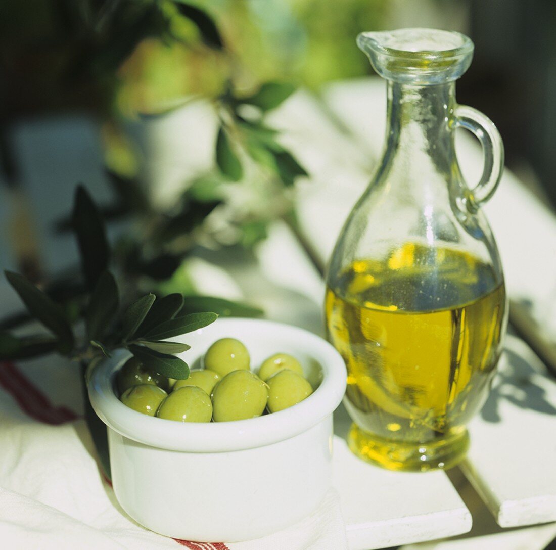 Olive oil and green olives